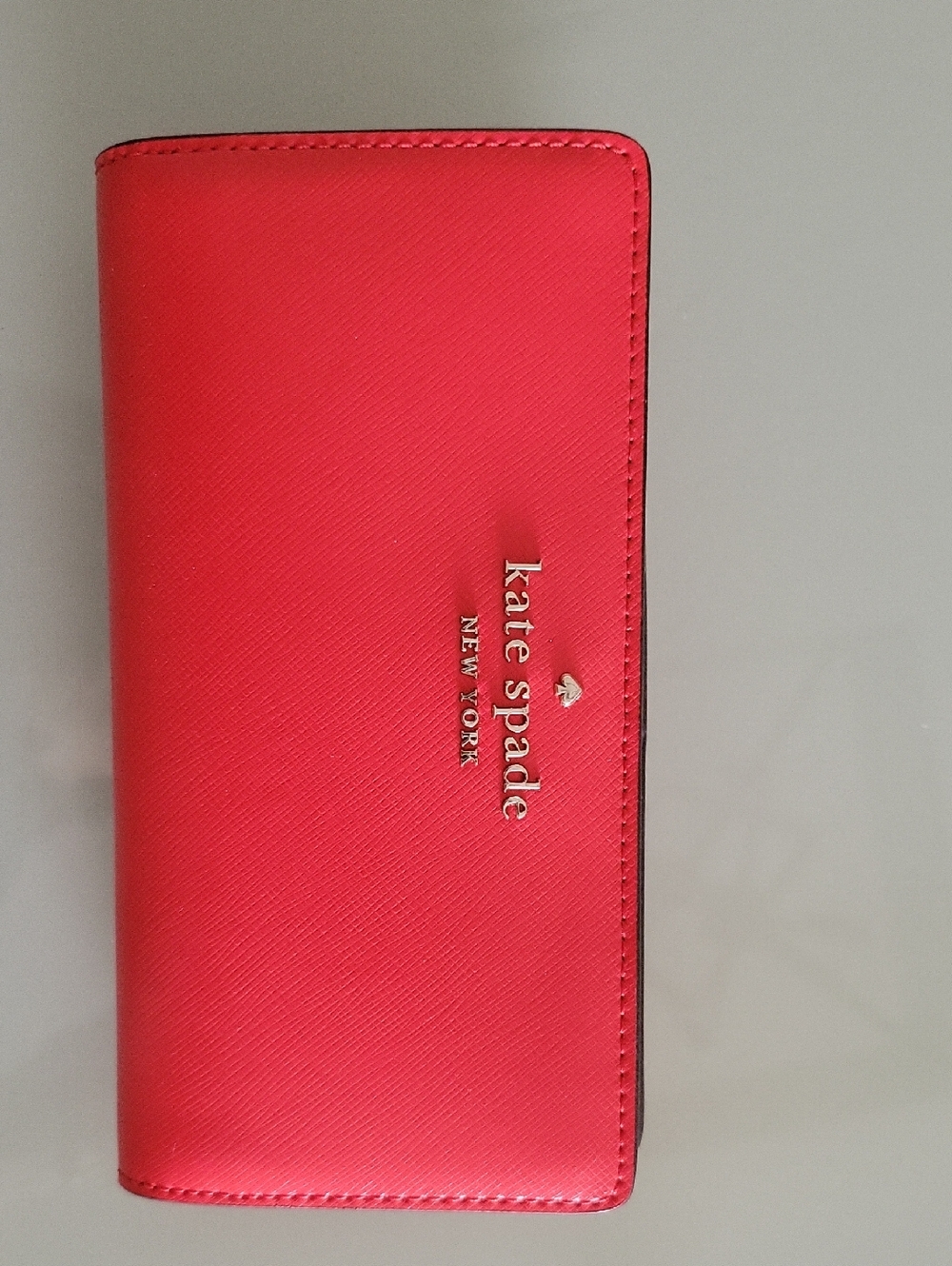 kate spade Bright Coral Red Saffiano Leather Continental Wallet